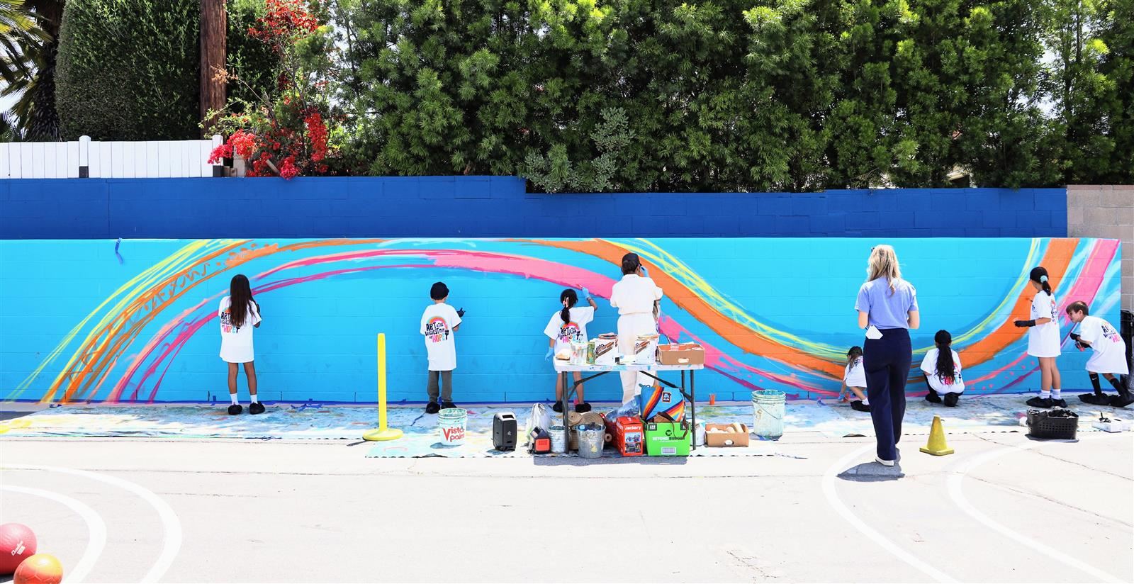 Students paint vibrant mural at Hermosa Drive